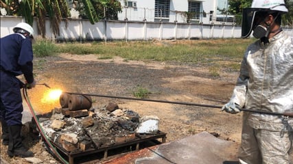 Use acetylene torch to heat one end to red hot, then start blowing oxygen