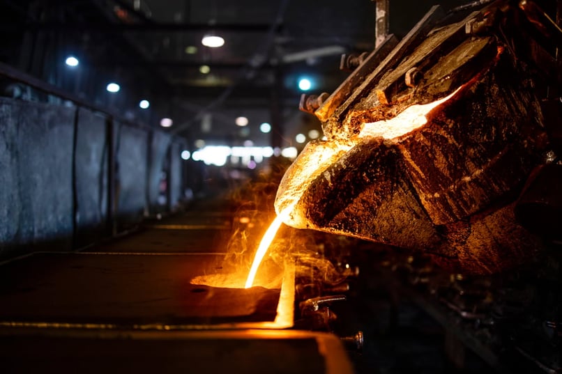 Looking into a melting furnace in a foundry for aluminum casting