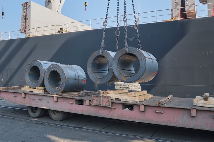loading-hot-rolled-steel-coils-on-2144558295