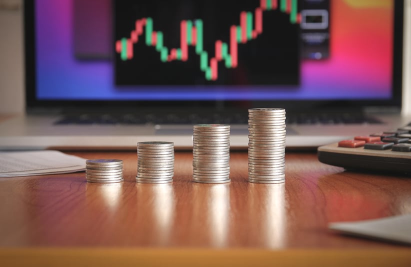 stack-money-coin-on-wood-desk-1922789099